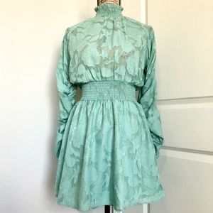 Semi Sheer Textured Ruched Smocked Mini Dress